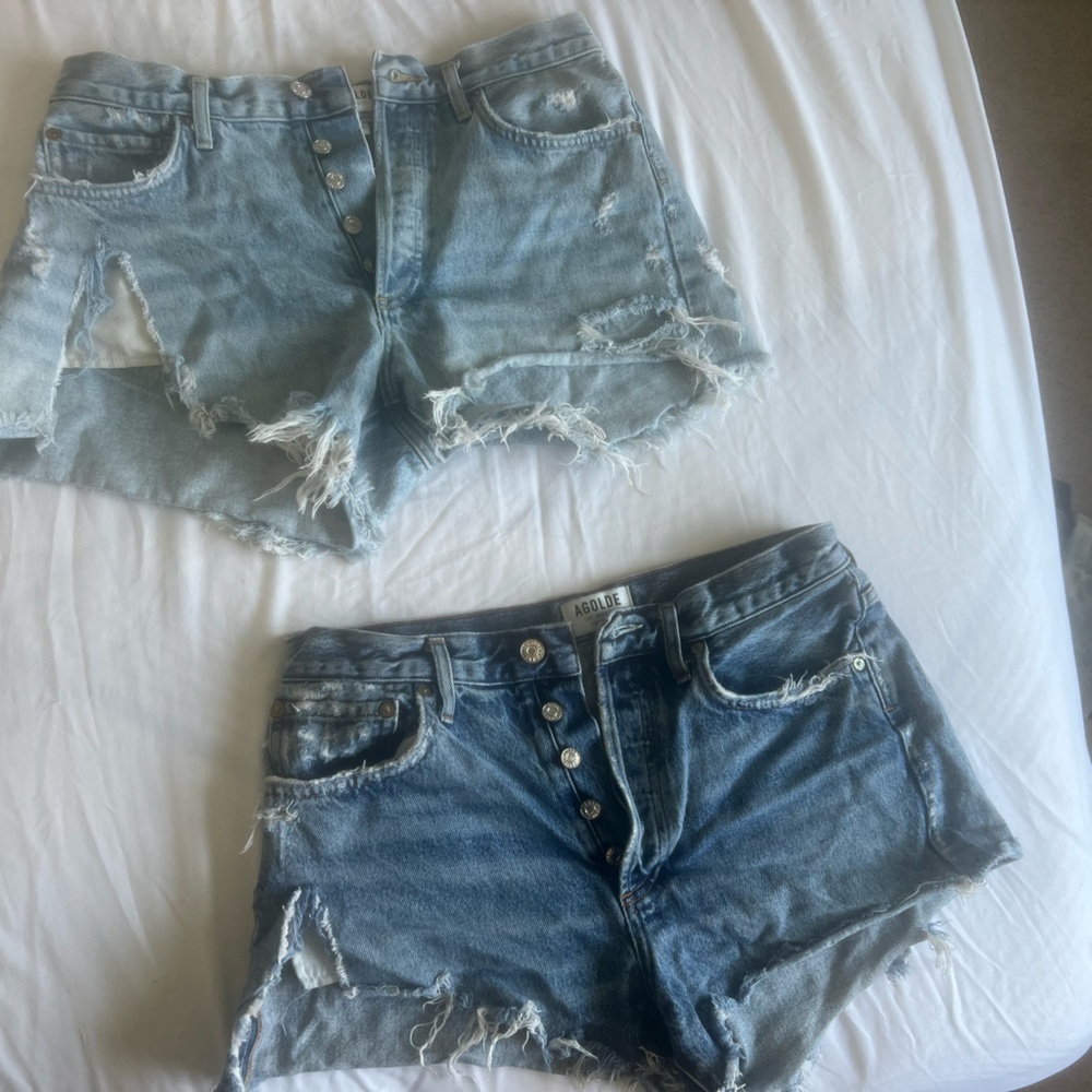 AGOLDE: two pairs of heavily distressed shorts